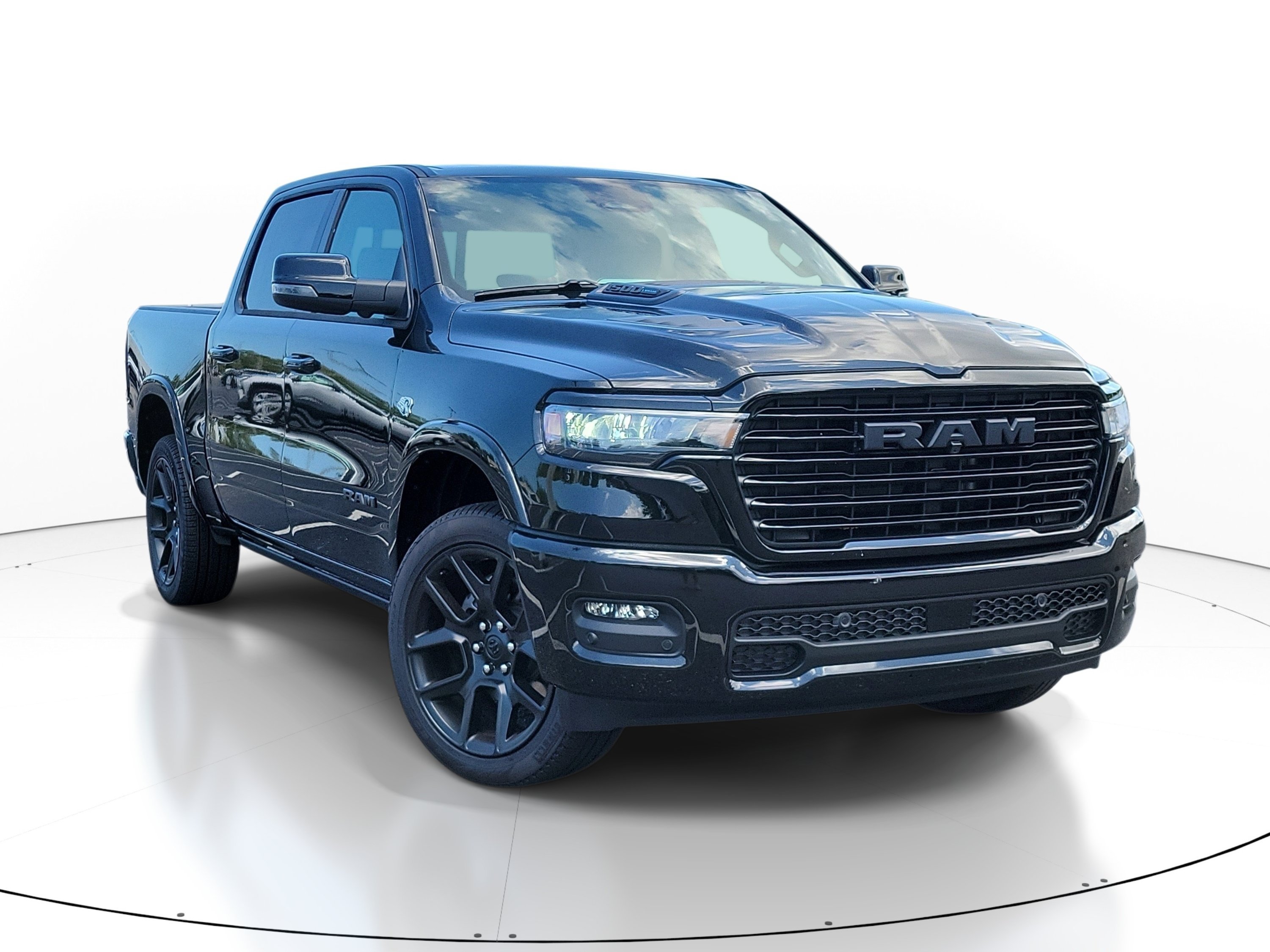New 2026 Diamond Black Crystal Pearl-Coat Exterior Paint RAM Laramie image 1