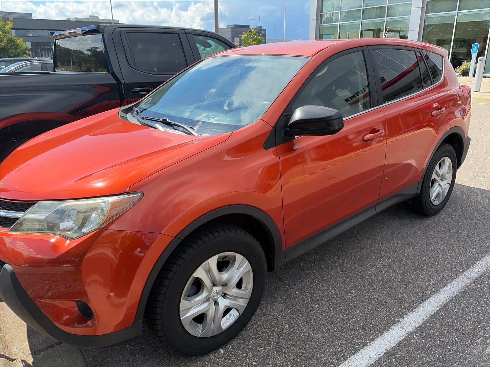 Used 2015 Hot Lava Toyota LE image 3