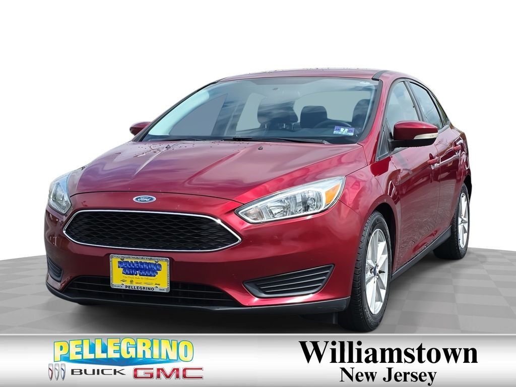 Red 2015 Ford Focus SE Sedan Front-Wheel Drive