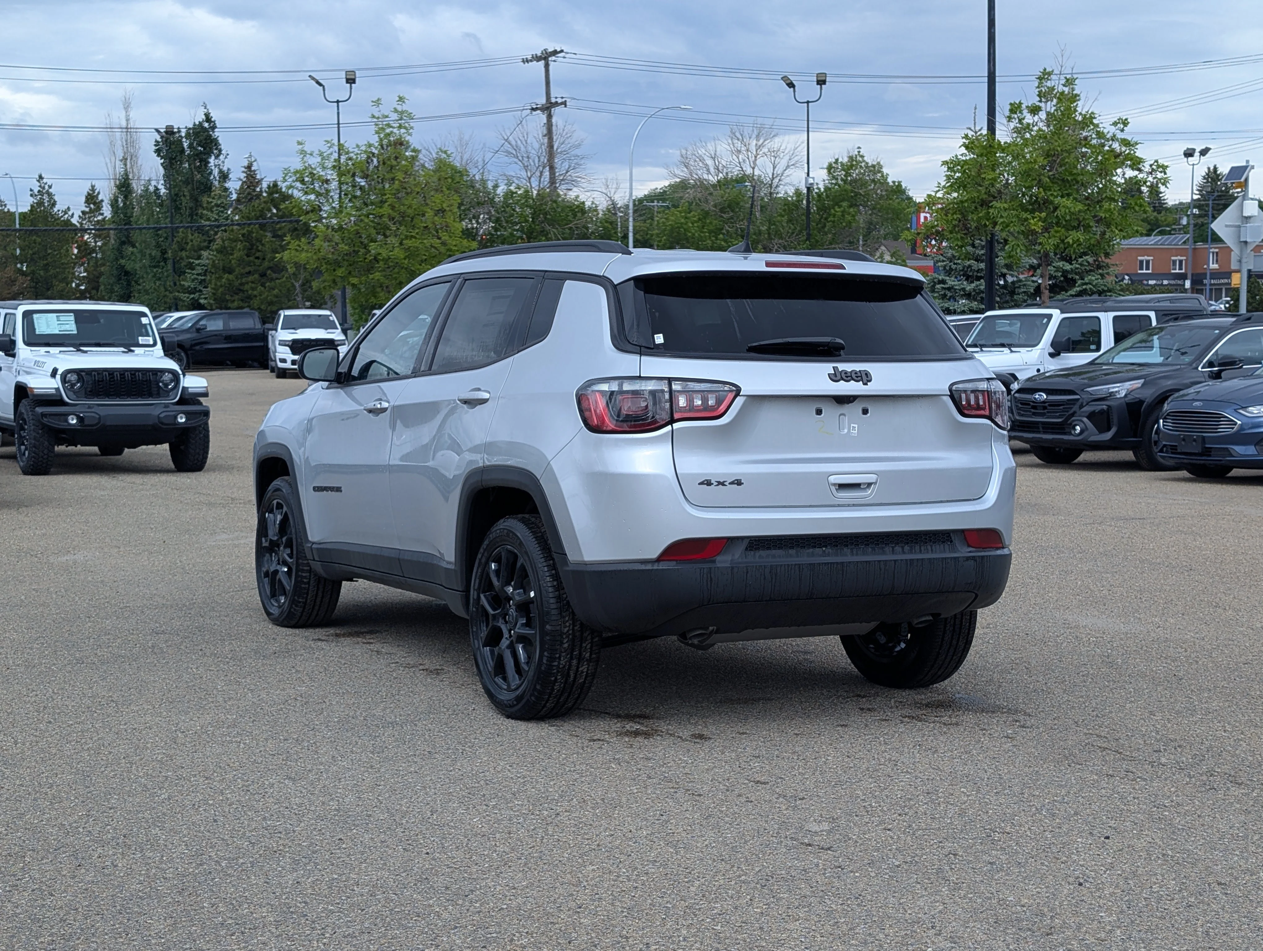 New 2026 Silver Zynith Metallic Jeep North image 4