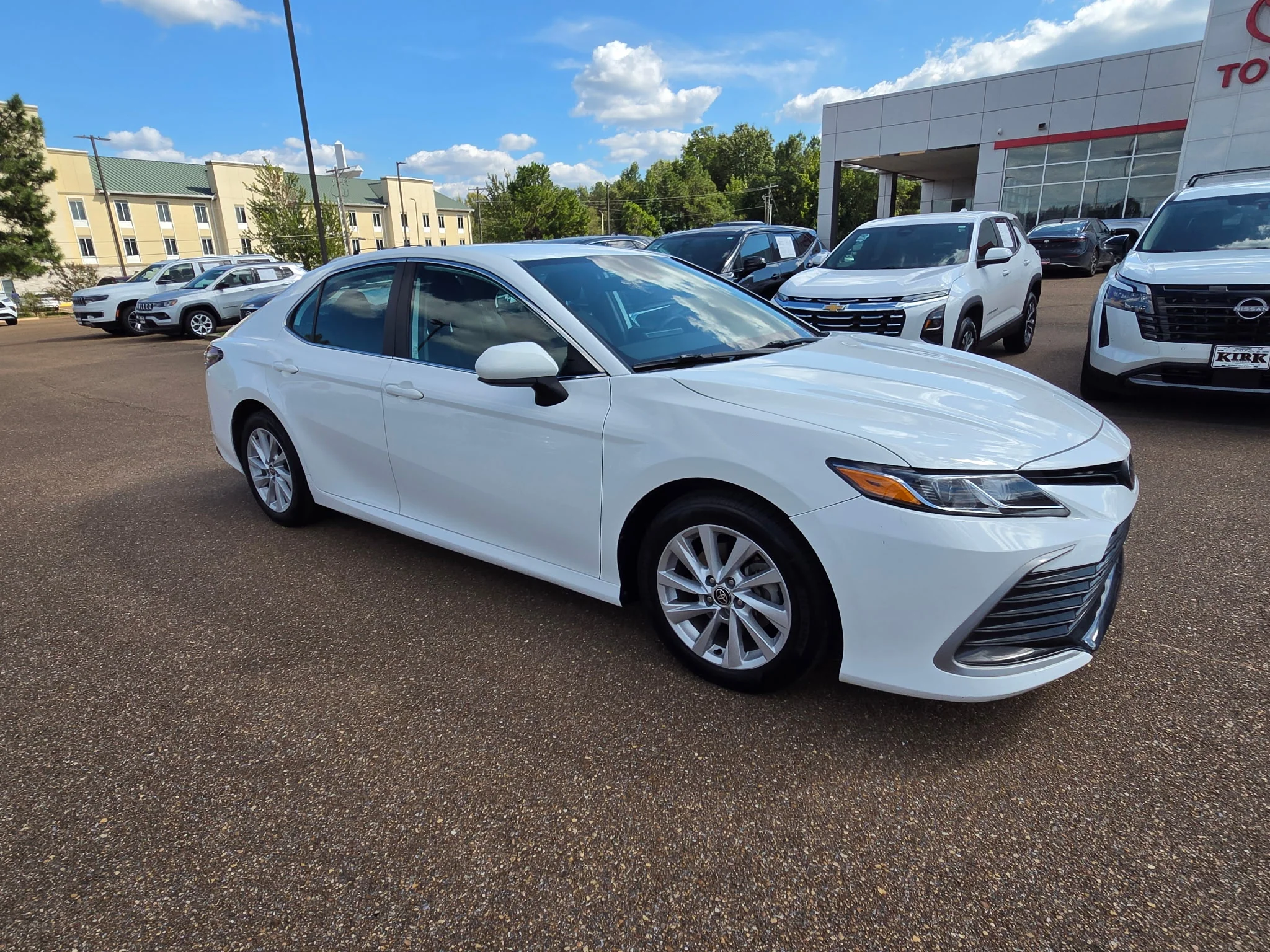 Used 2021 Toyota Camry LE with VIN 4T1C11AKXMU409603 for sale in Grenada, MS