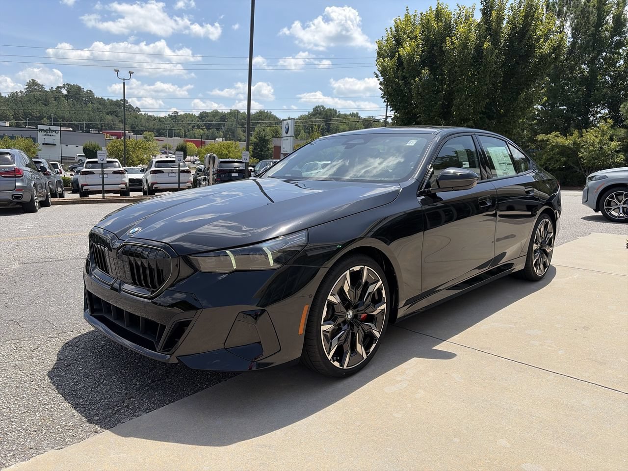 New 2027 Black Sapphire Metallic BMW 530i image 4