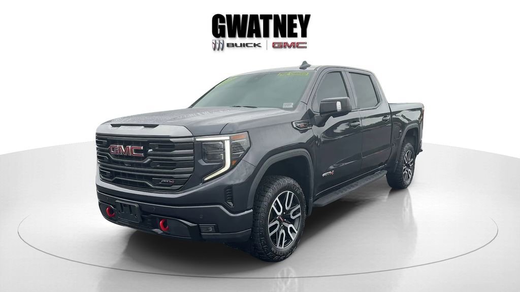 Used 2023 Titanium Rush Metallic GMC AT4 image 7