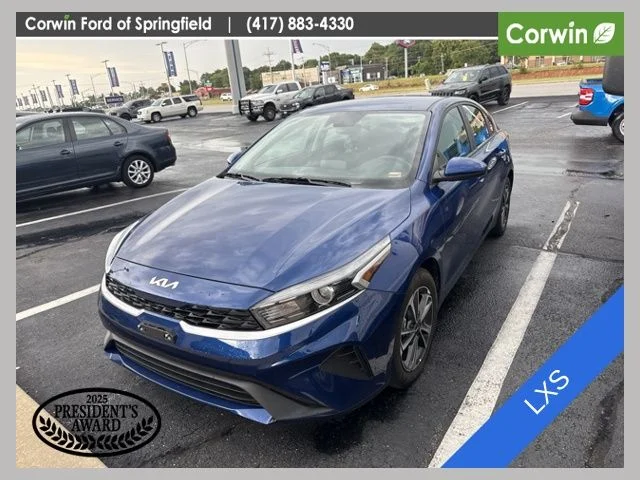 Used 2024 Deep Sea Blue Kia LXS image 1