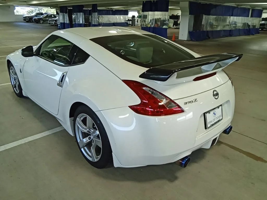Used 2010 Pearl White Nissan Touring image 7