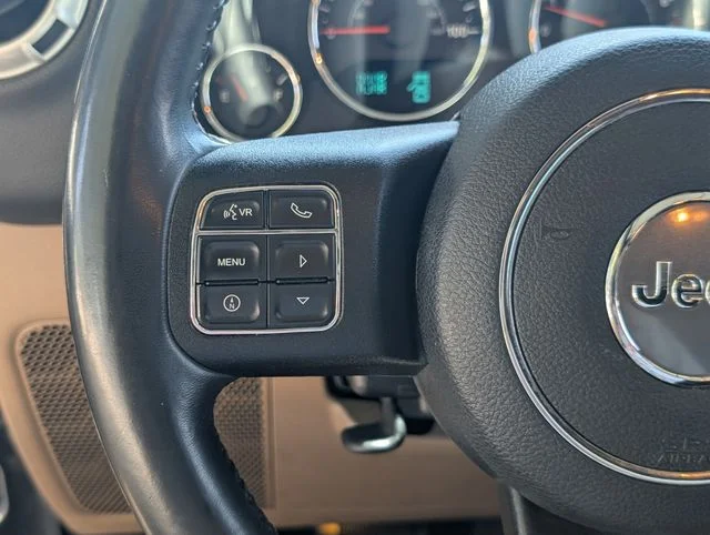 Used 2014 Crystal Metallic Jeep Unlimited Sahara image 13