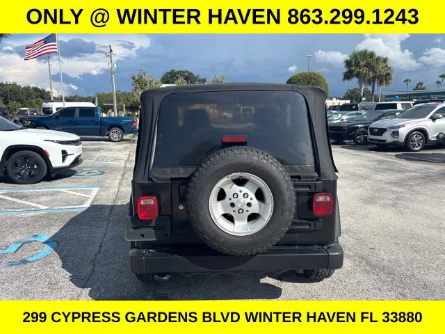 Used 2004 Black Jeep X image 4