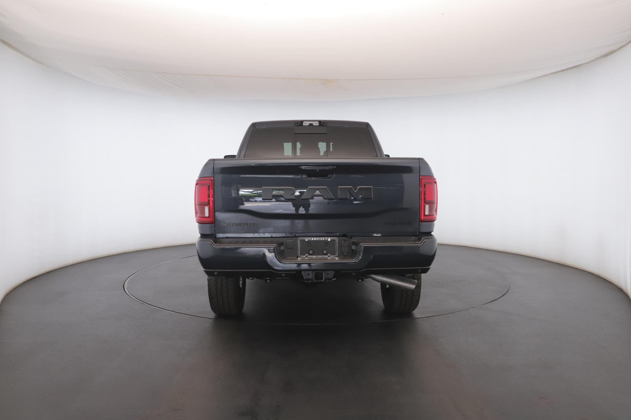 Used 2026 Forged Blue Metallic Ram Laramie 4x4 Mega Cab 6
