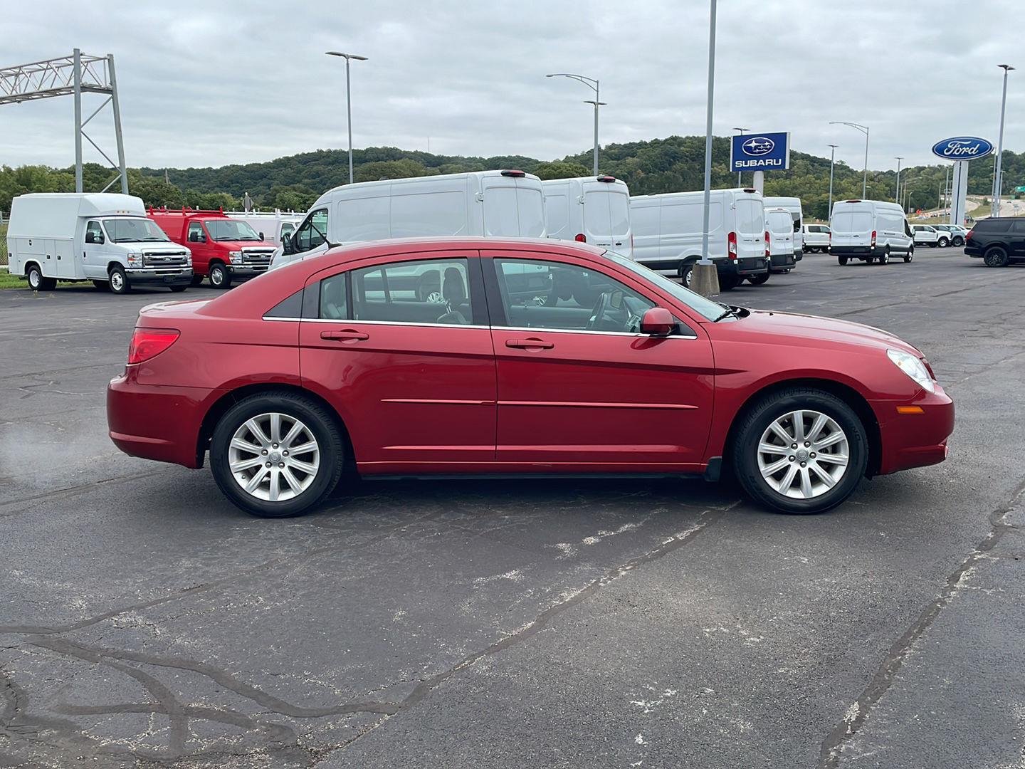 Used 2010 Inferno Red Crystal Pearl Chrysler Limited image 6