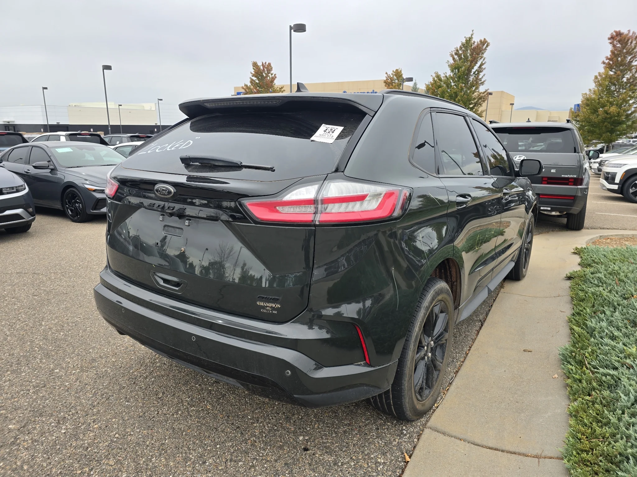 Used 2024 Forged Green Metallic Ford SE image 16