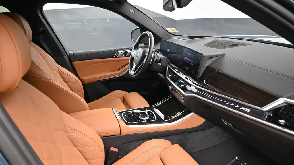 Certified Used 2024 Blue BMW sDrive40i image 2