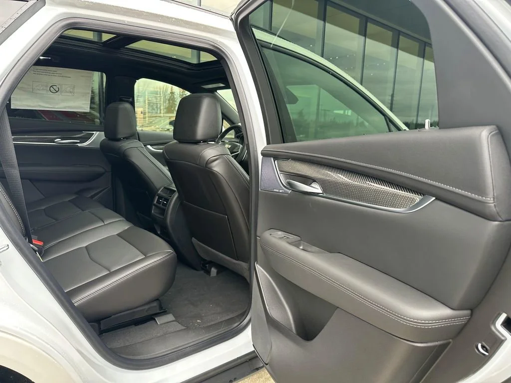 New 2025 Crystal White Tricoat Cadillac Sport image 13