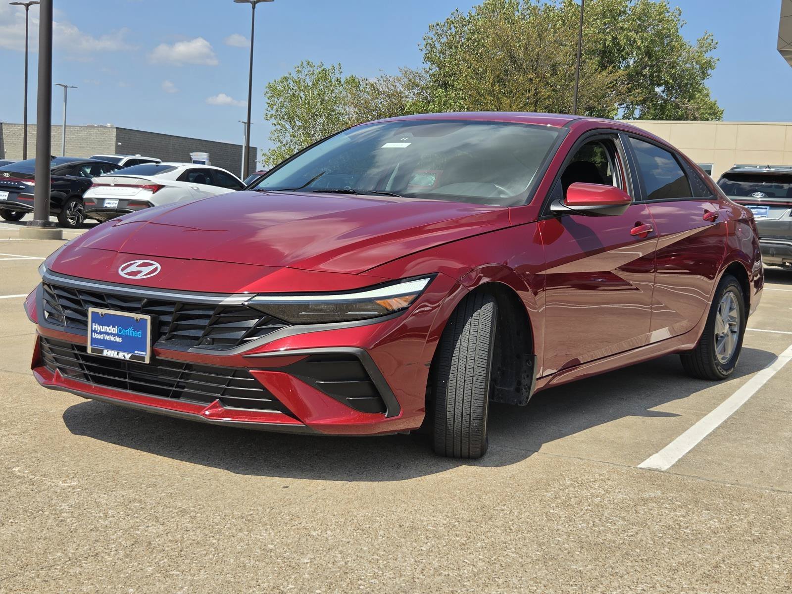 Certified Used 2025 Ultimate Red Hyundai SE image 2