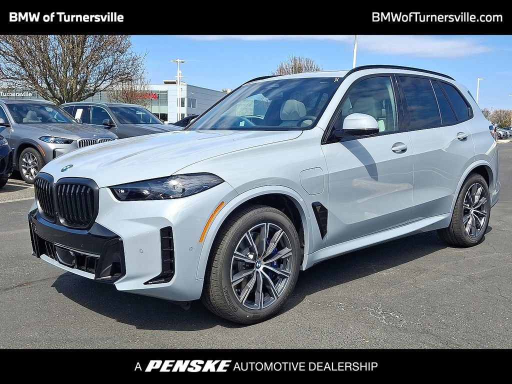 Used 2026 Brooklyn Grey Metallic BMW xDrive50e image 1