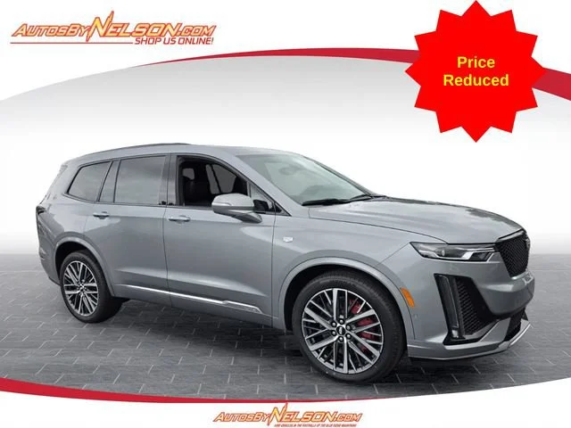 Used 2023 Argent Silver Metallic Cadillac Sport image 1