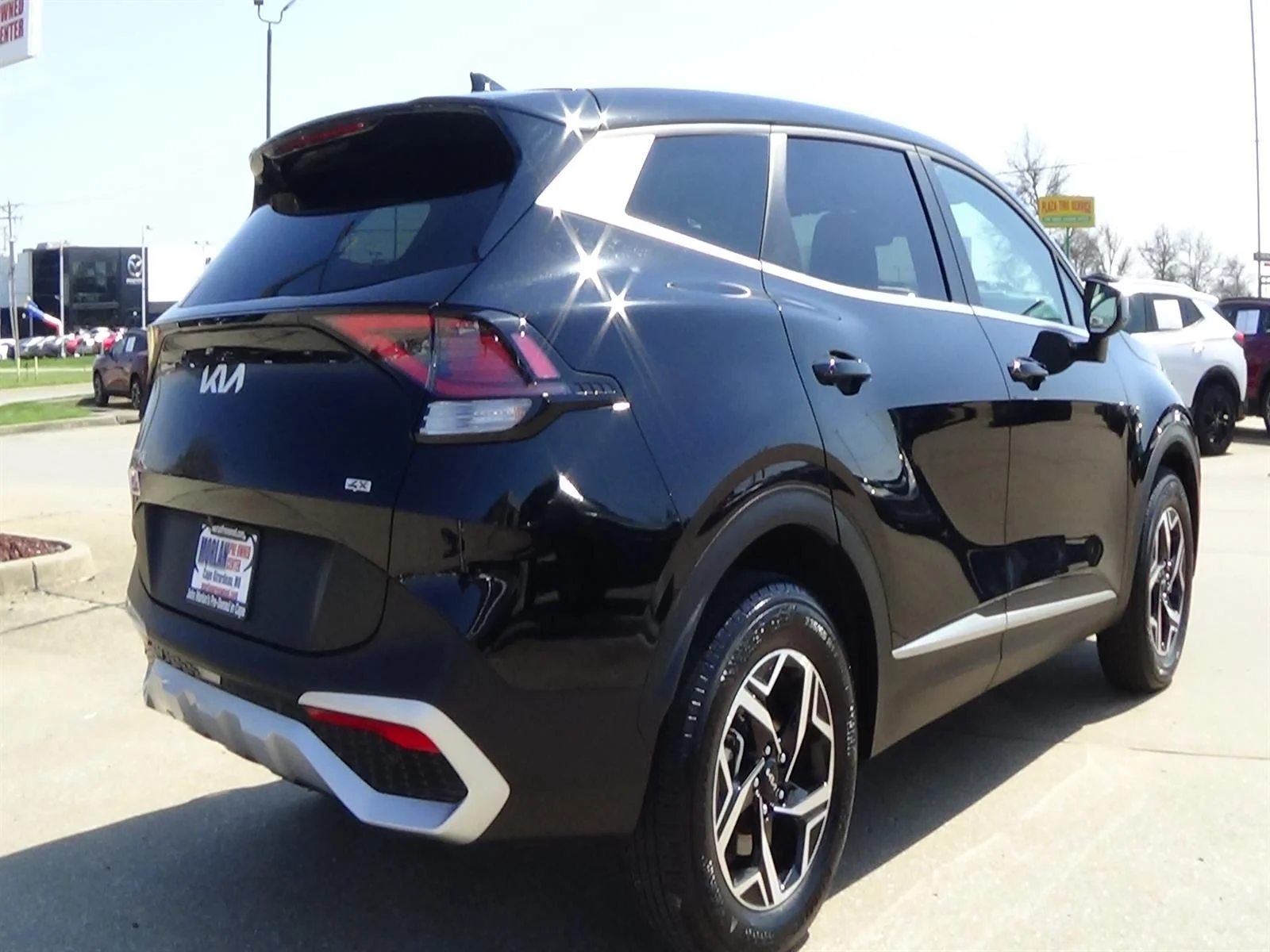 Used 2025 Ebony Black (eb) Kia LX image 6