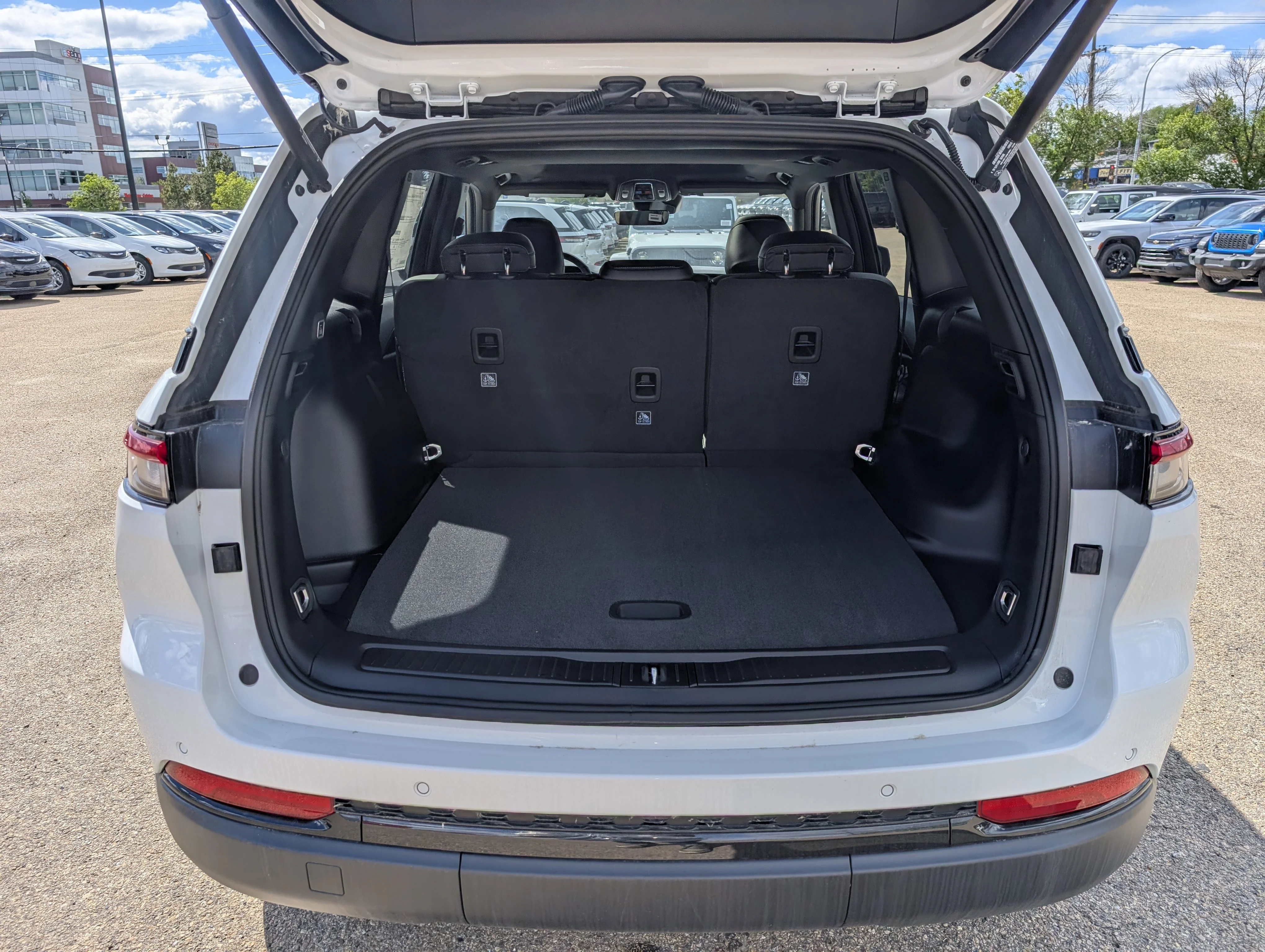 New 2025 Bright White Jeep Altitude image 6