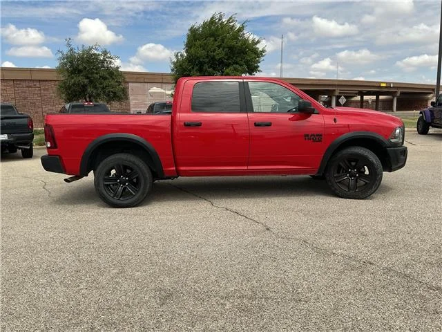 Used 2024 Flame Red Clearcoat RAM SLT 4x4 Crew Cab 5.6 ft. box 140 in. WB image 8