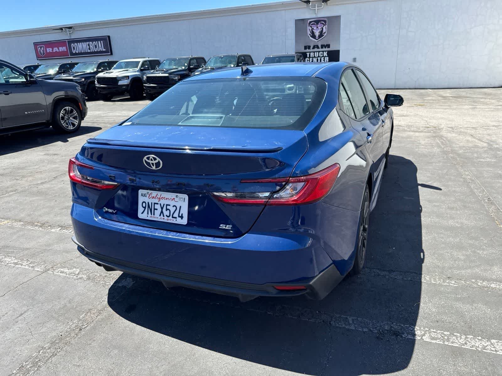 Used 2025 Reservoir Blue Toyota SE image 15
