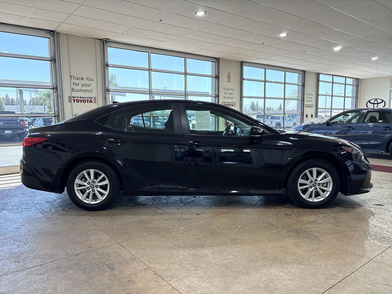 Certified Used 2025 Midnight Black Metallic Toyota LE image 3