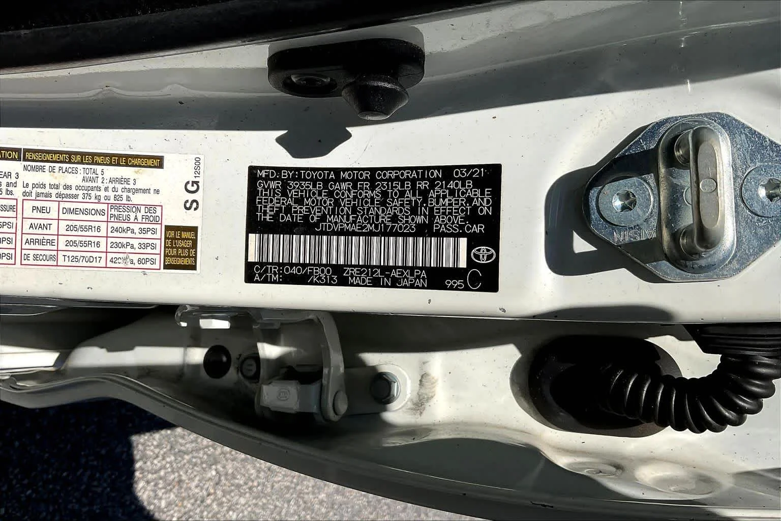 Used 2021 Super White Toyota LE image 34