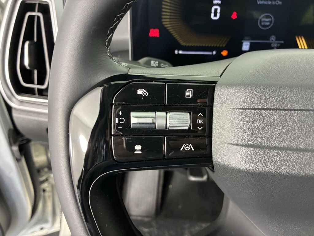 New 2026 Ivory Silver Kia LX image 14