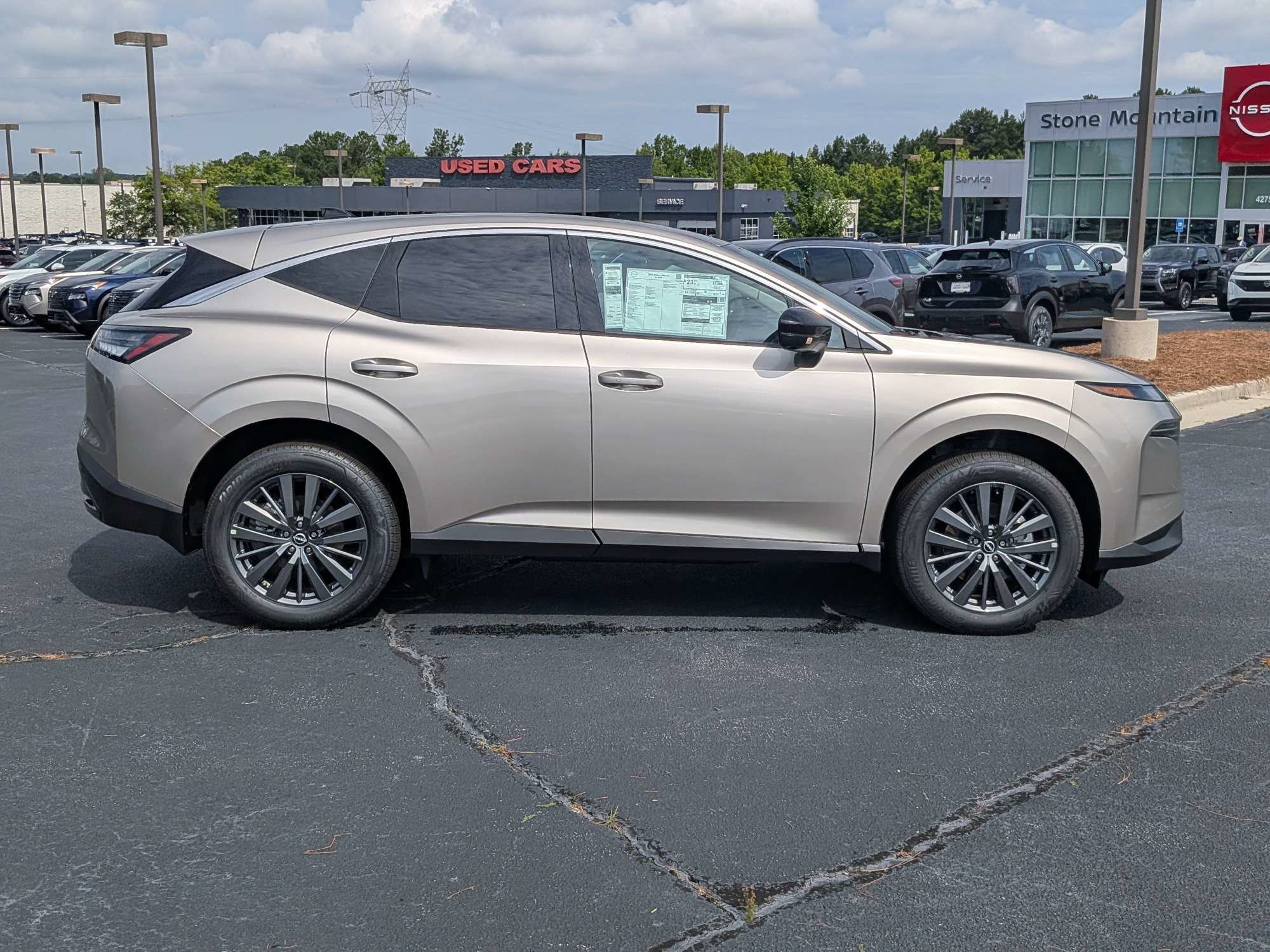 New 2026 Gold Nissan SL image 2