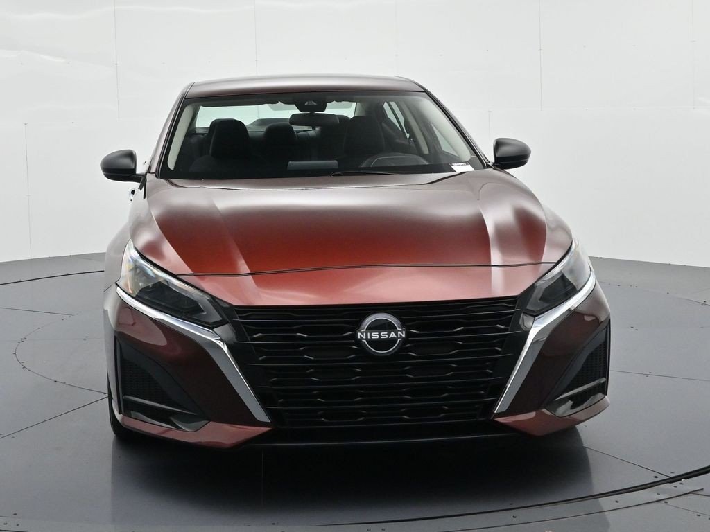 Used 2025 Garnet Pearl Nissan SV FWD image 2
