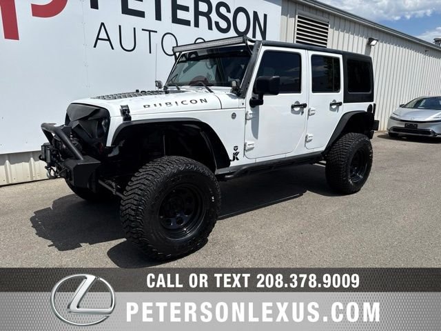 Used 2013 White Jeep Unlimited Sport image 8