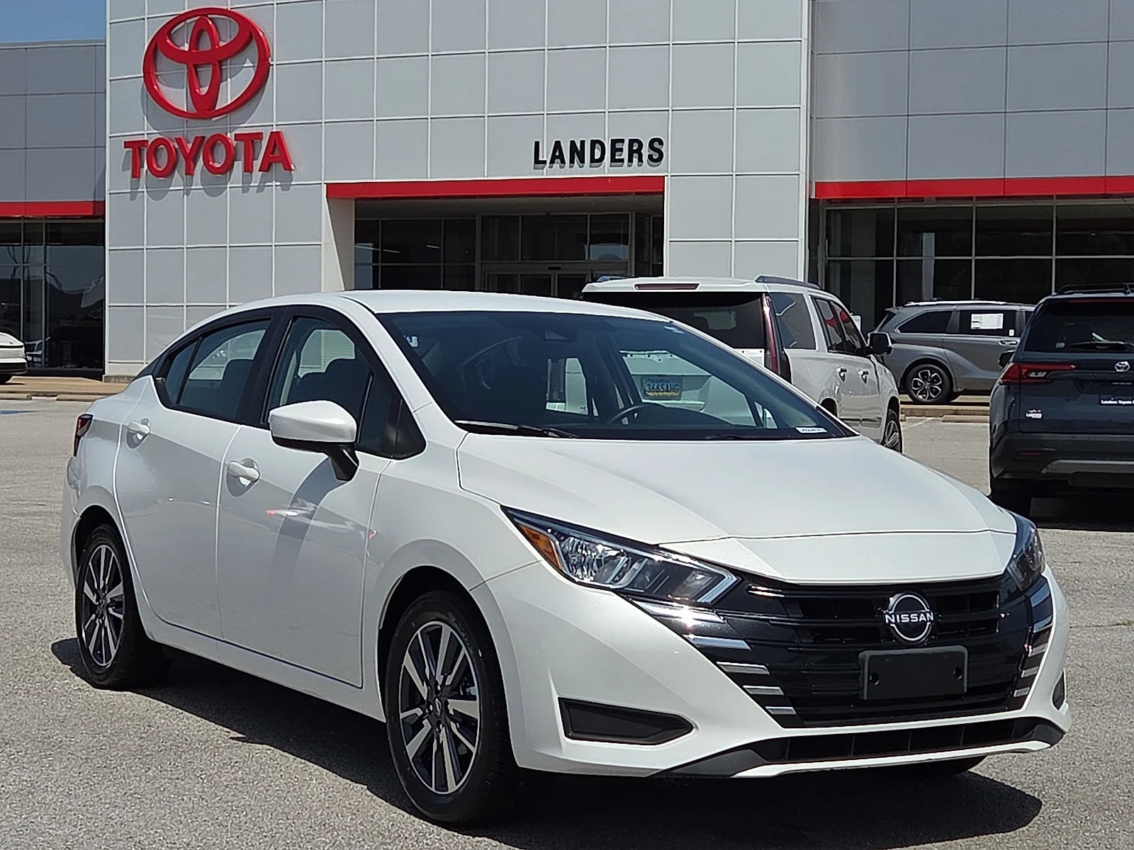 Used 2024 Aspen White Tricoat Nissan SV image 1