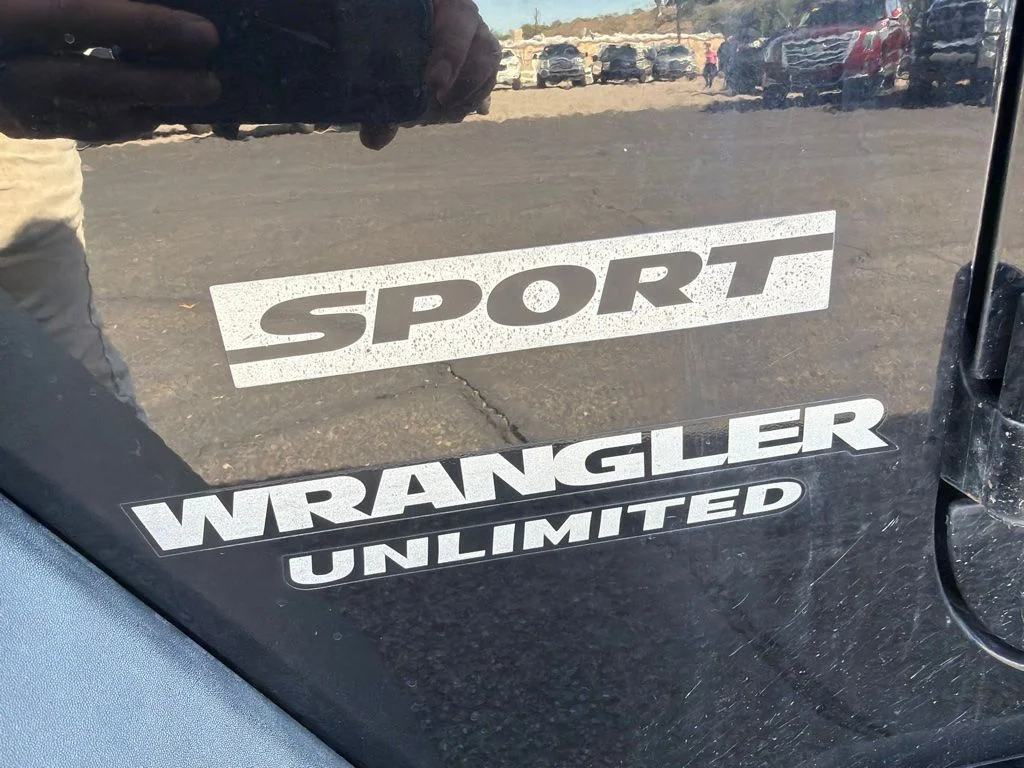 Used 2014 Black Clearcoat Jeep Unlimited Sport image 11