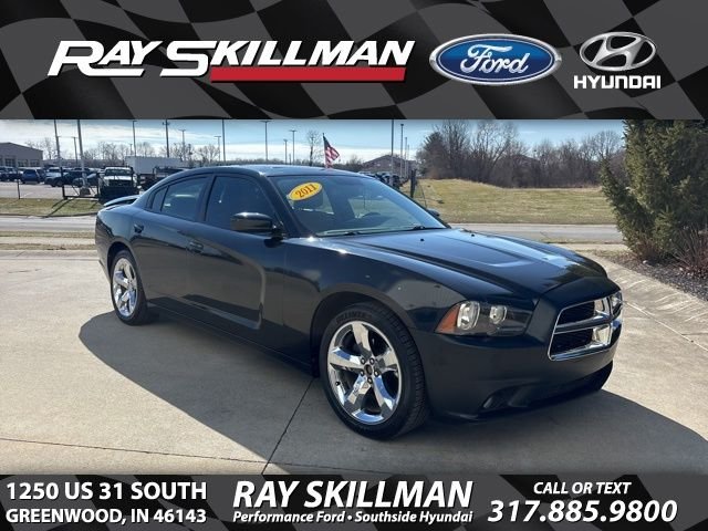 Used 2011 Black Dodge Rallye Plus image 1