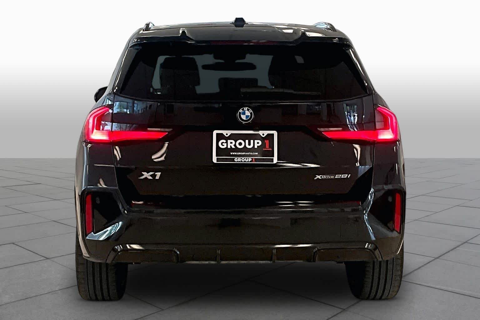 Used 2024 Black Sapphire Metallic BMW xDrive28i image 4