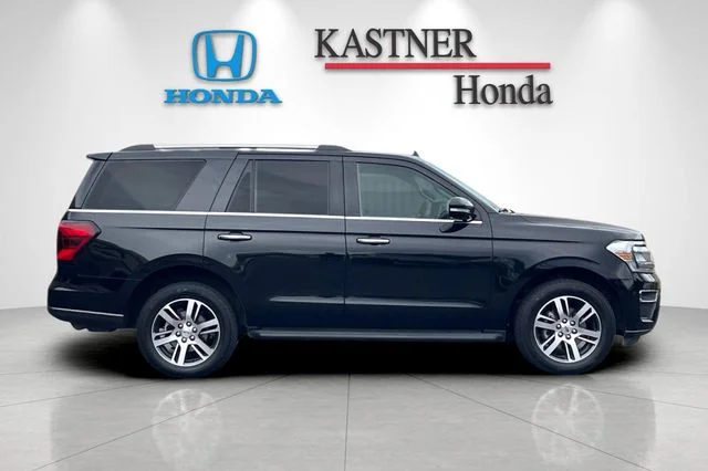 Used 2024 Black Metallic Ford Limited image 4