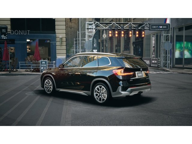 New 2027 Black Sapphire Metallic BMW  image 2