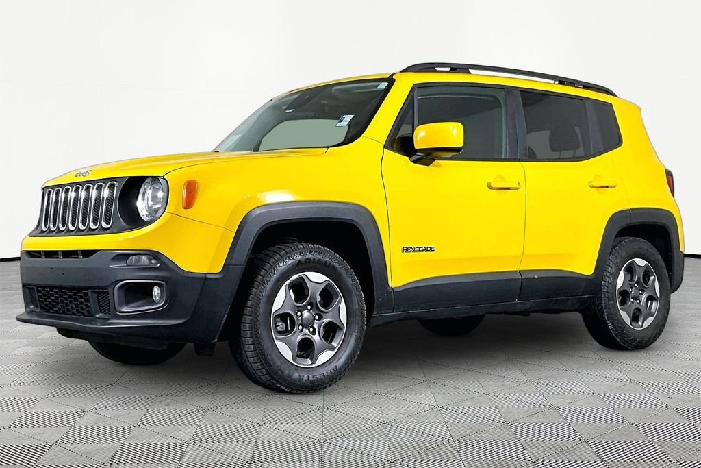 Used 2016 Yellow Jeep Latitude image 1