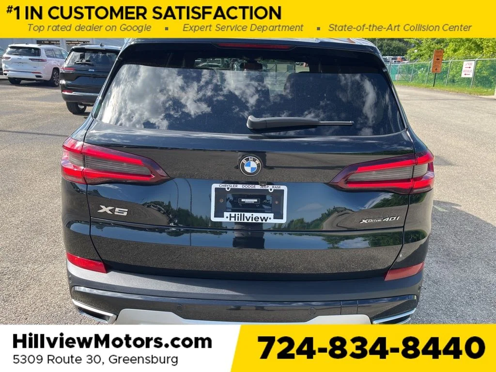 Certified Used 2022 Black Sapphire Metallic BMW xDrive40i image 4