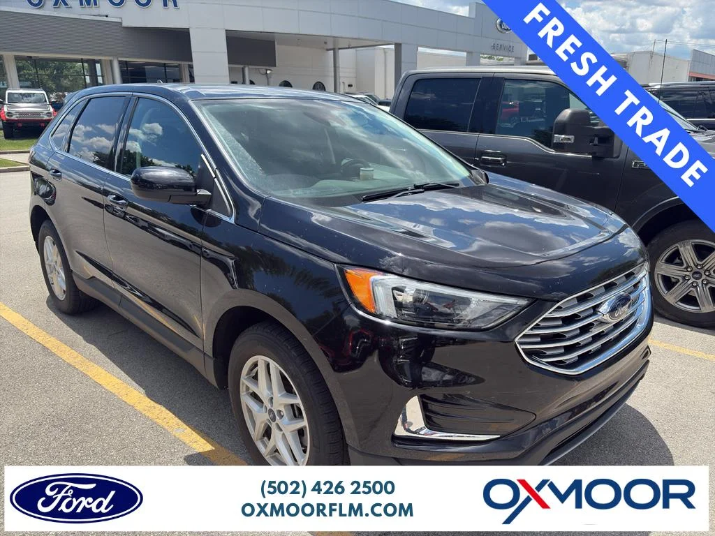 Used 2022 Agate Black Metallic Ford SEL image 1