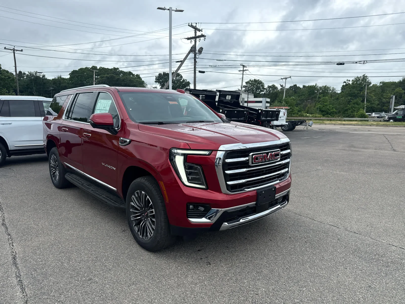 New 2026 Volcanic Red Tintcoat GMC Elevation image 7