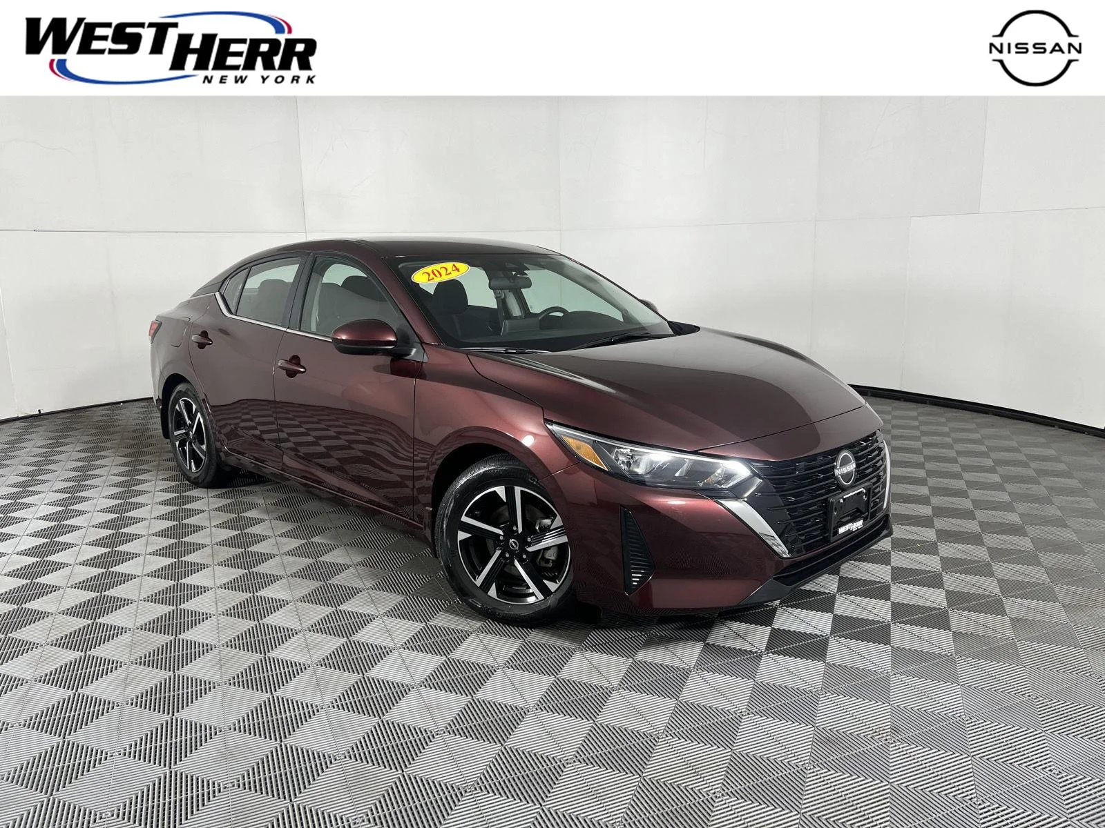Used 2024 Rosewood Metallic Nissan SV image 1