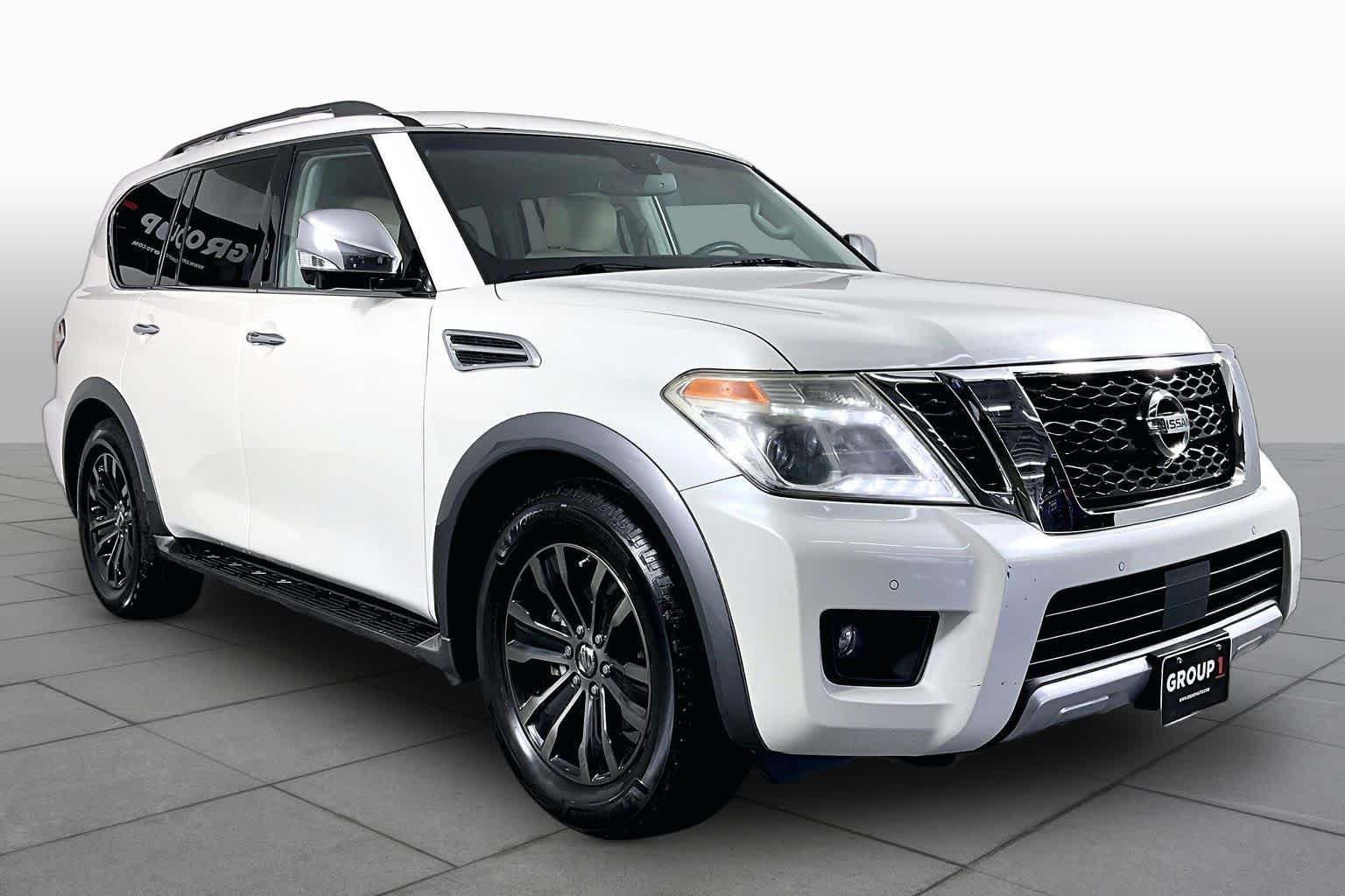 Used 2017 Pearl White Nissan Platinum image 3