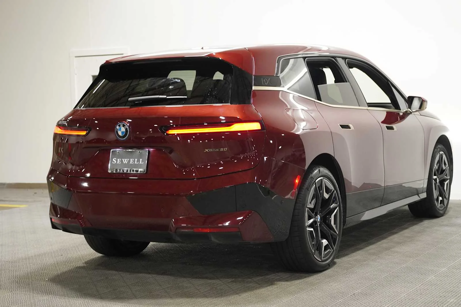 Certified Used 2024 Aventurin Red Metallic BMW xDrive50 image 4