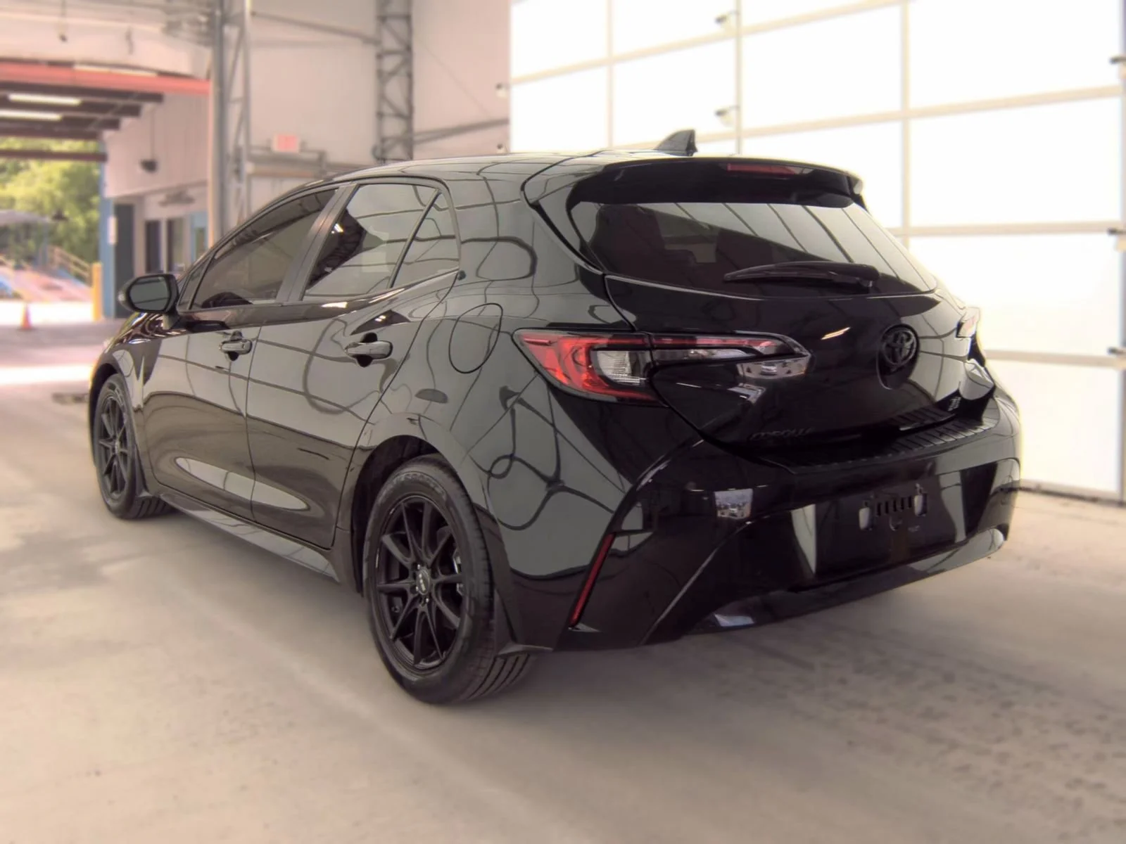 Used 2024 Midnight Black Metallic Toyota SE image 4