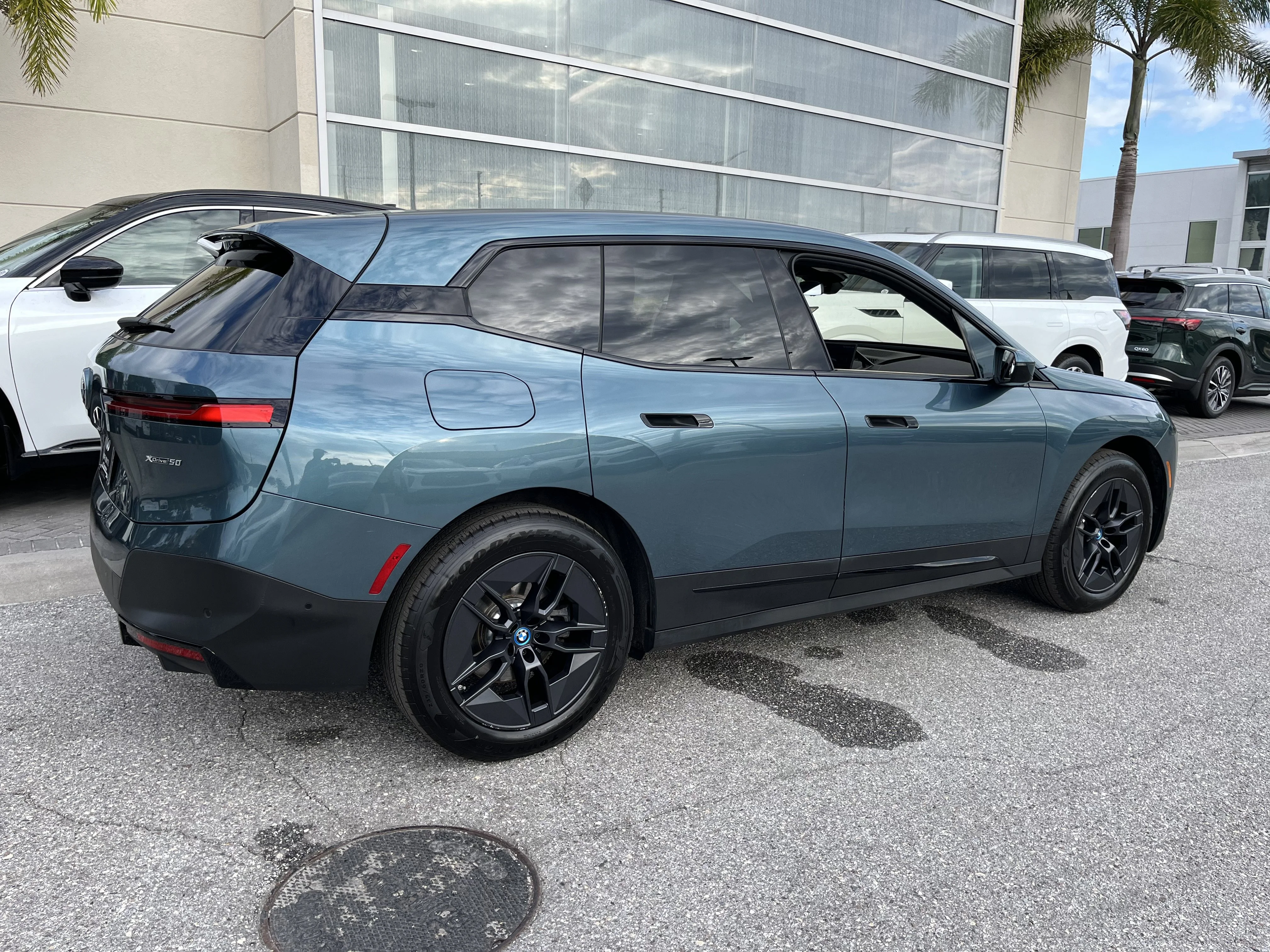 Used 2025 Blue Ridge Mountain Metallic BMW xDrive50 image 10