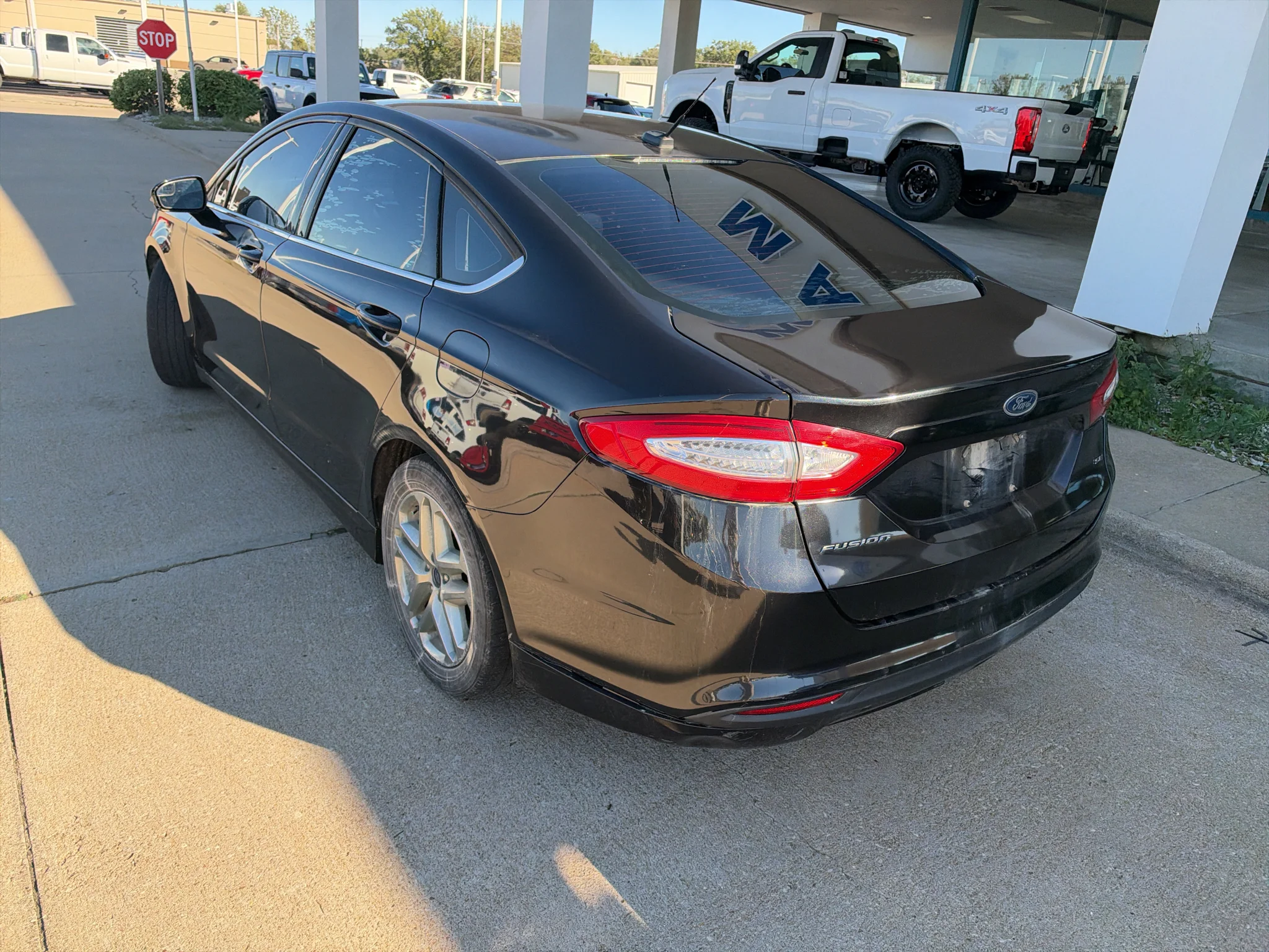 Used 2015 Ruby Red Tinted Clearcoat Ford SE image 8
