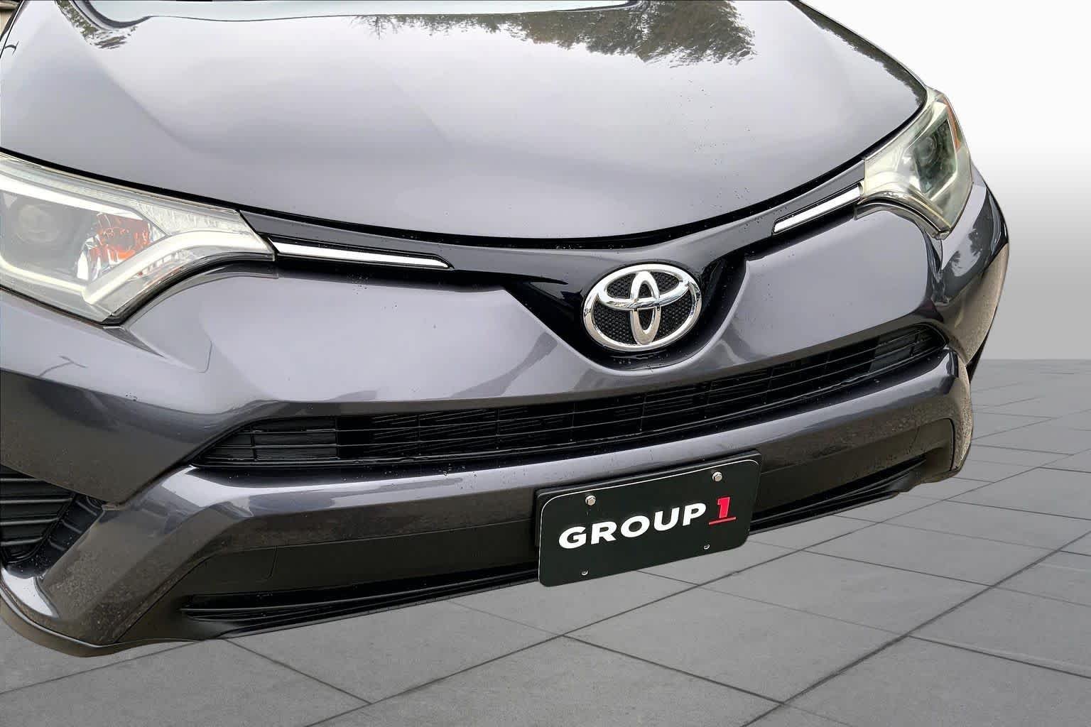 Used 2016 Magnetic Gray Metallic Toyota LE image 32