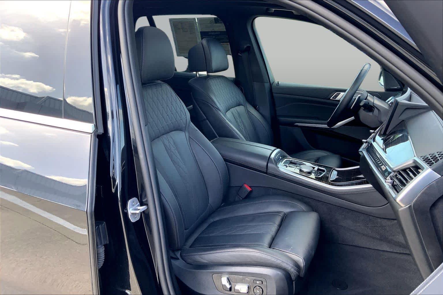 Used 2025 Black Sapphire Metallic BMW xDrive50e image 9