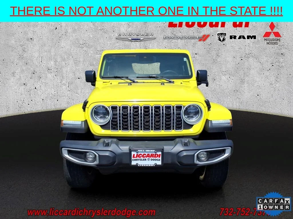 Used 2024 Yellow Jeep Sahara image 2