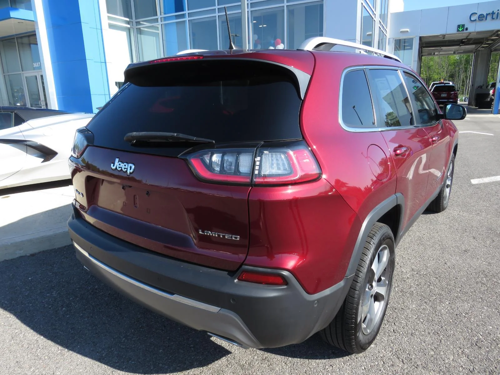 Used 2021 Velvet Red Pearlcoat Jeep Limited image 7