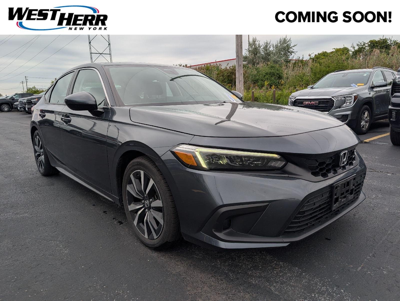 Used 2024 Meteorite Gray Metallic Honda EX-L image 1